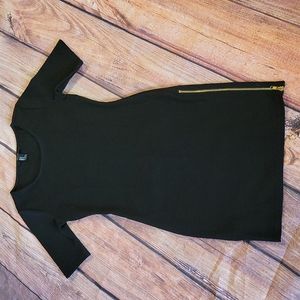 Black mini dress with gold zipper
